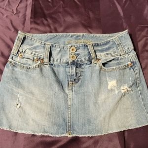 American Eagle distressed denim mini skirt